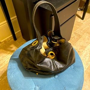 Black patent Yves Saint Laurent CAPRI purse bucket bag Good used condition